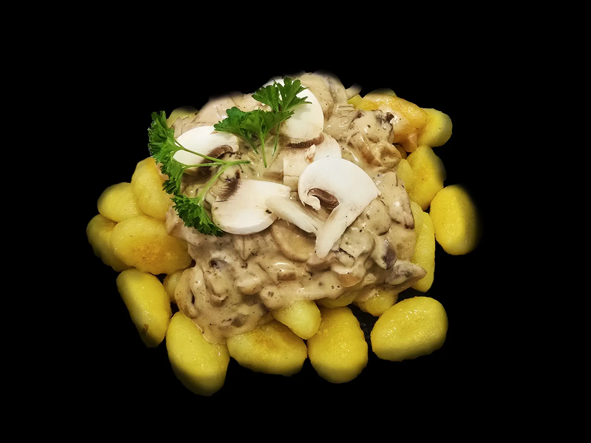 Gnocchis nappés d’une sauce forestière aux champignons